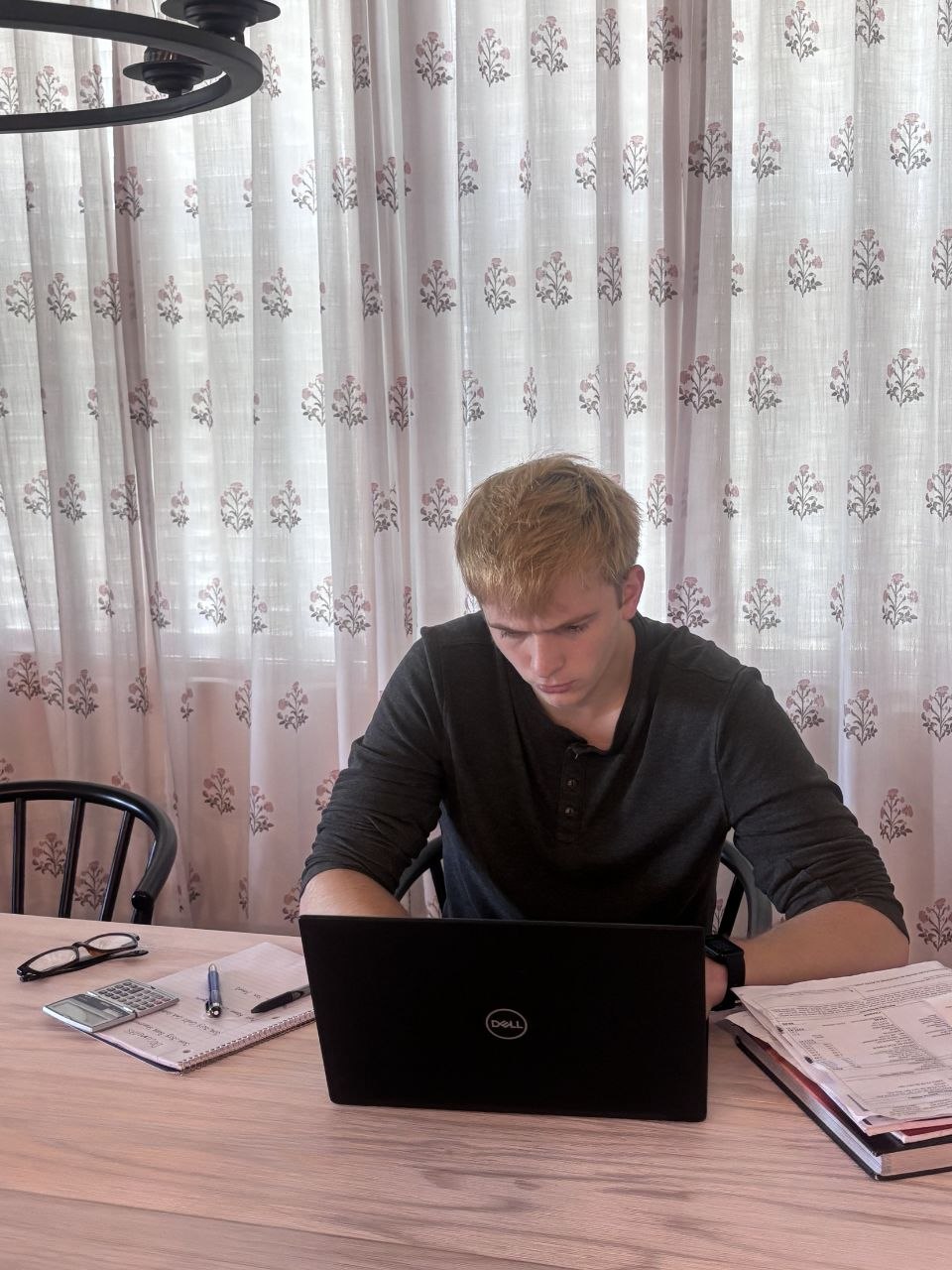 Clay Zarada working at his desk